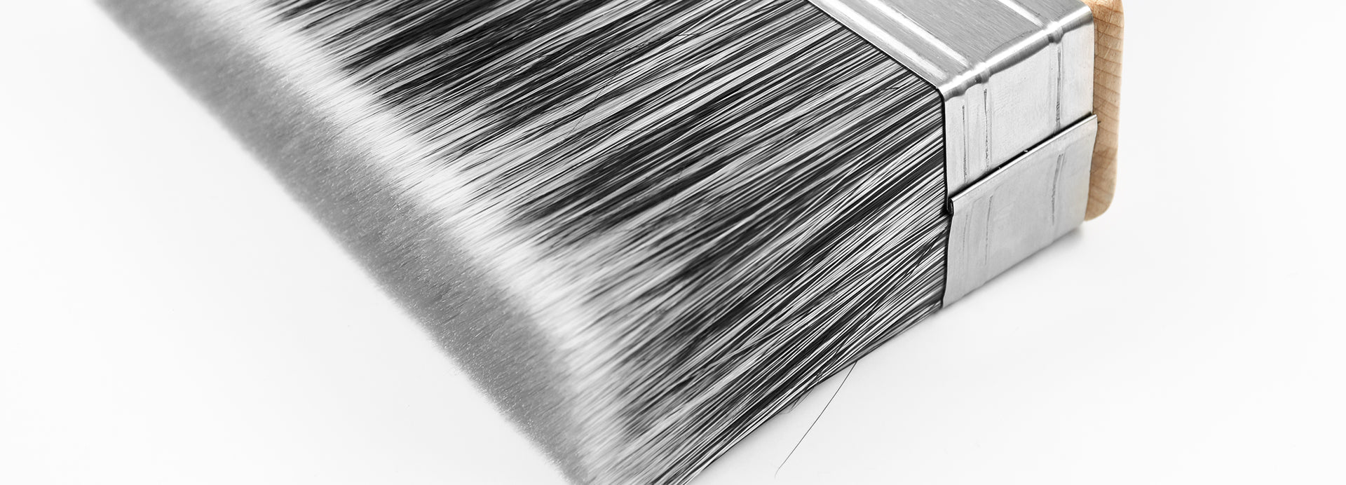 Close-up of a stack of books with a unique binding design on a white background