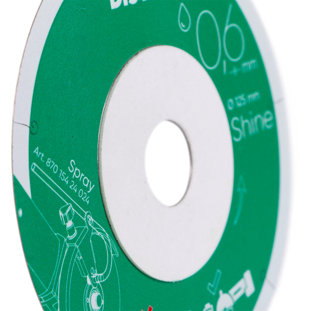 Close-up of a green and white disc with text and graphics.