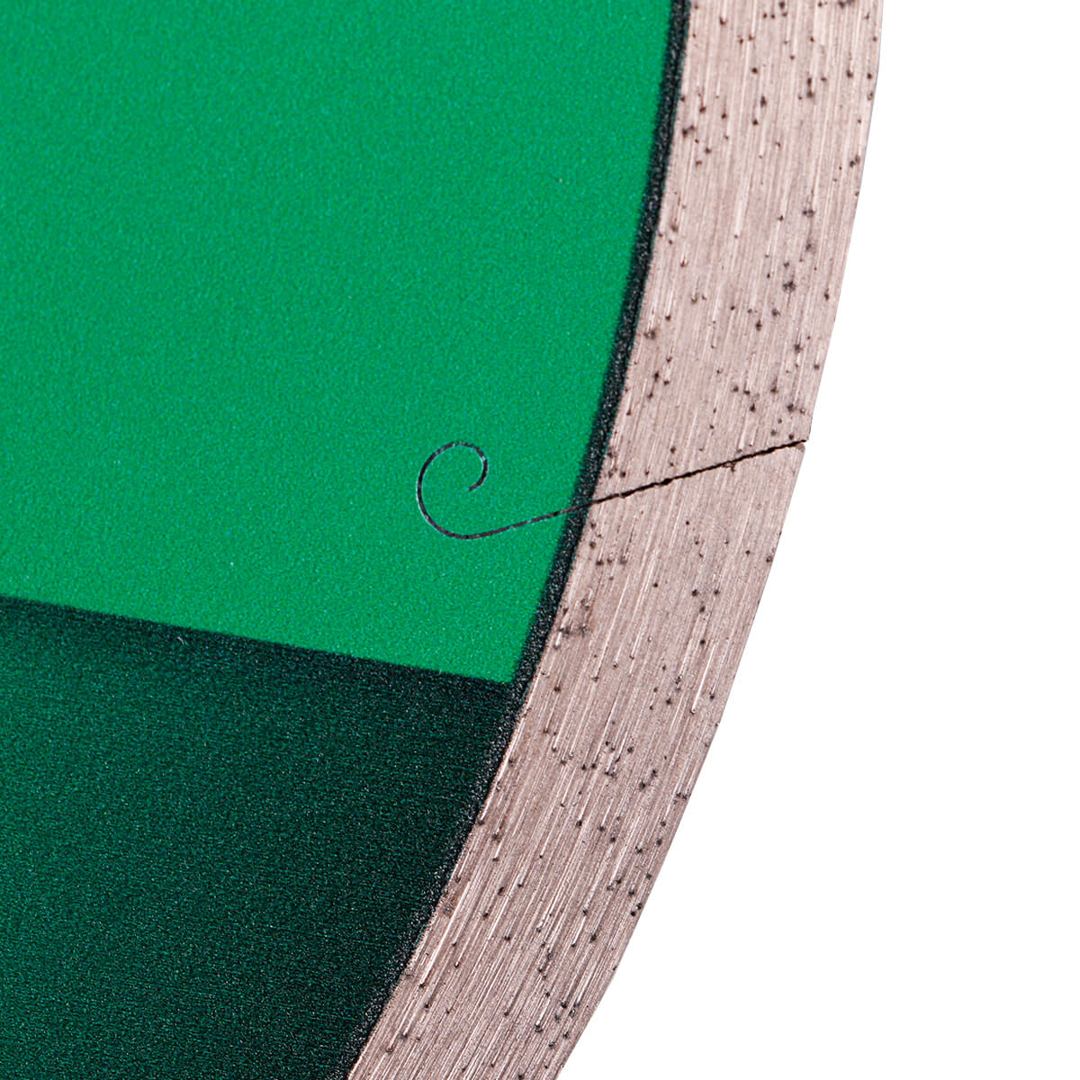 Close-up of a green and brown material with a circular detail on a white background