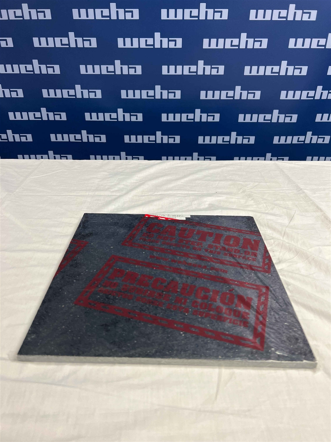 Weha Clear Countertop Protective Film - Caution Marked | Application View | bilingual print | Pro Tool Haus