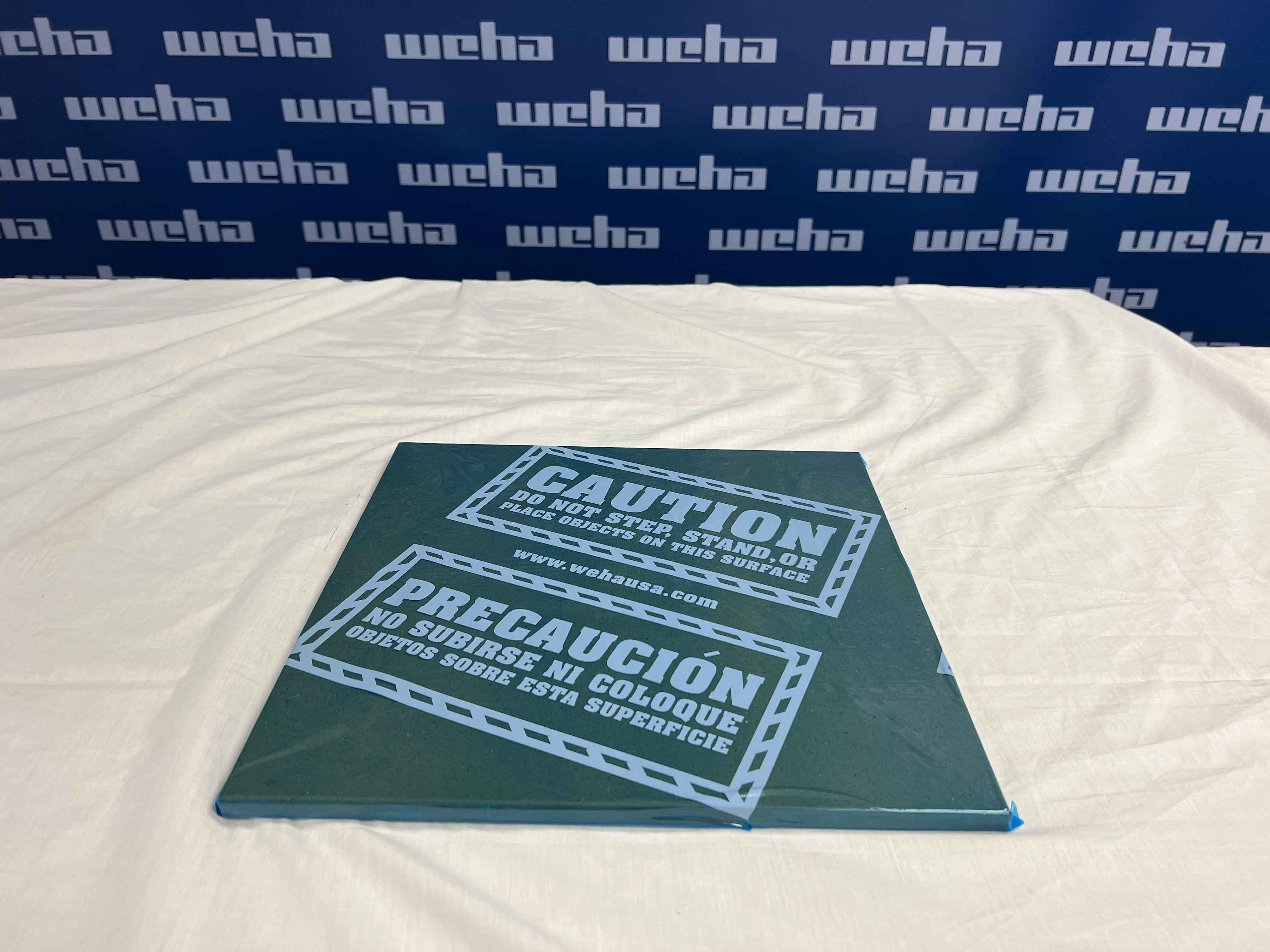 Weha Blue Countertop Protective Film Caution Marked | In-Use View | bilingual print | Pro Tool Haus