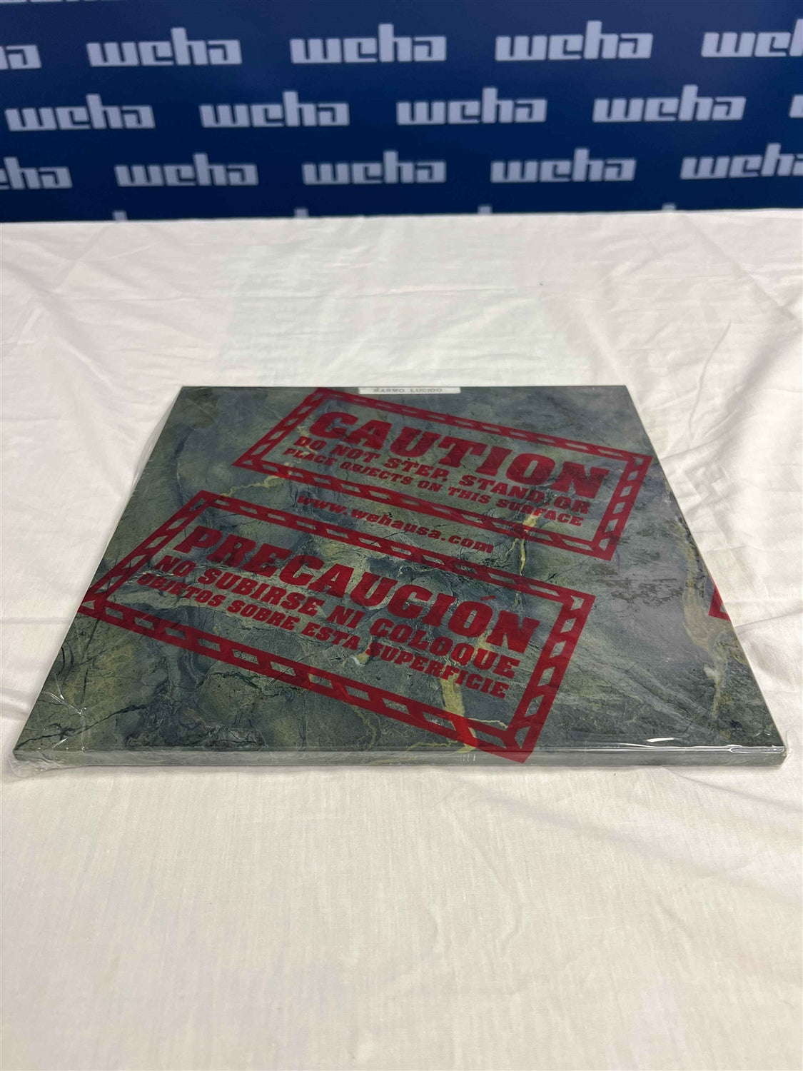 Weha Clear Countertop Protective Film - Caution Marked | Close-up Detail | bilingual print | Pro Tool Haus