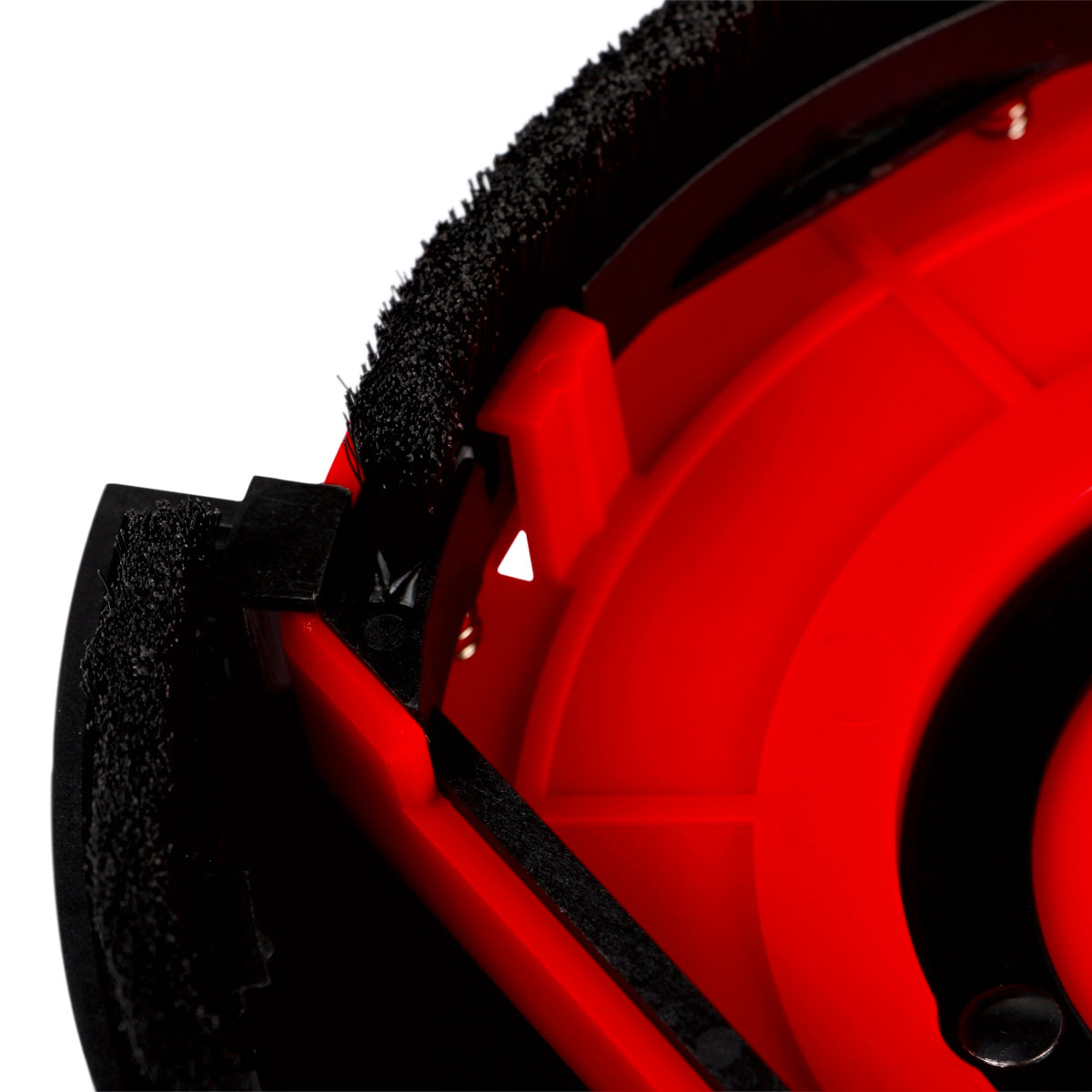 Close-up of a red wheel with black rim and tread pattern on a white background