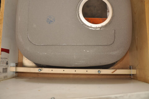 Undermount sink positioned in countertop opening