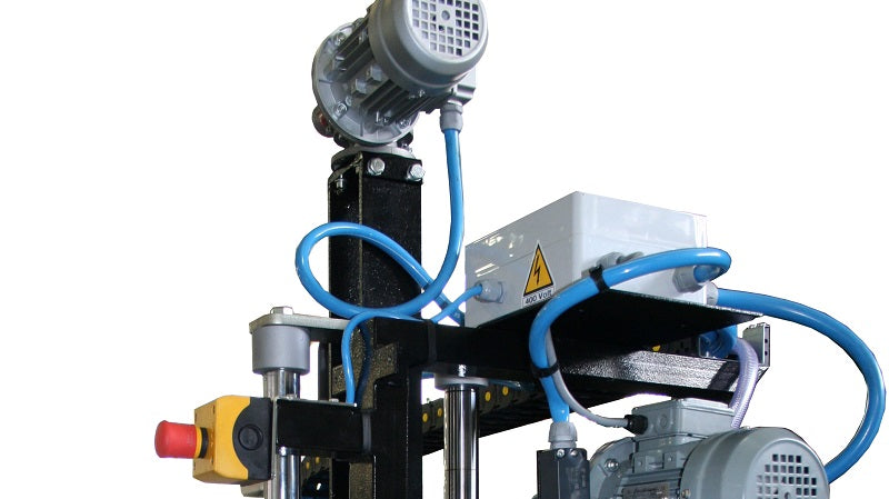 Mechanical component with blue hoses and a white background